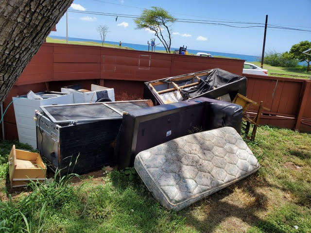Pile of old furniture ready to be removed by Oahu Dump Run